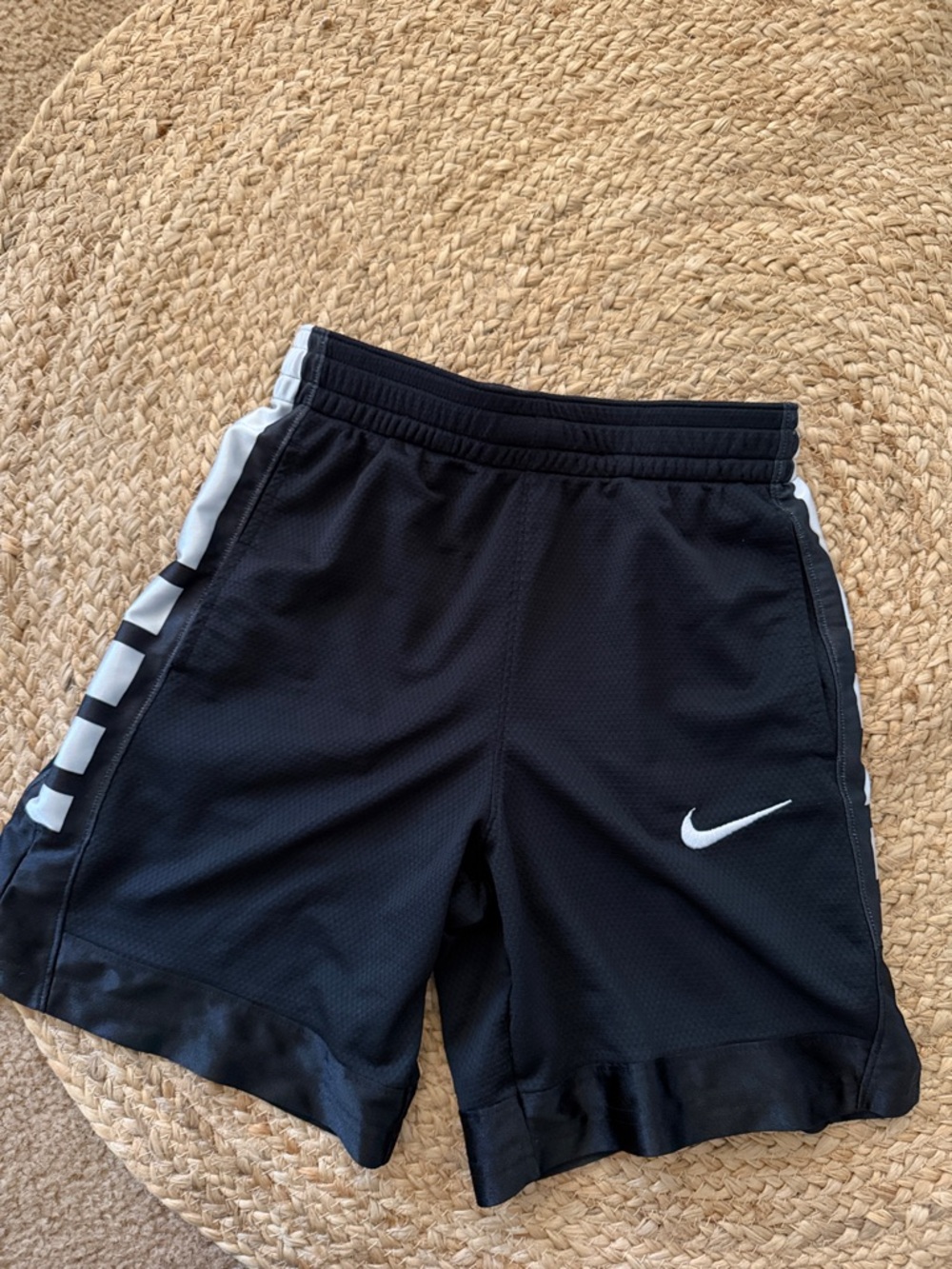 Nike Black Shorts with White Swoosh and Side Panels